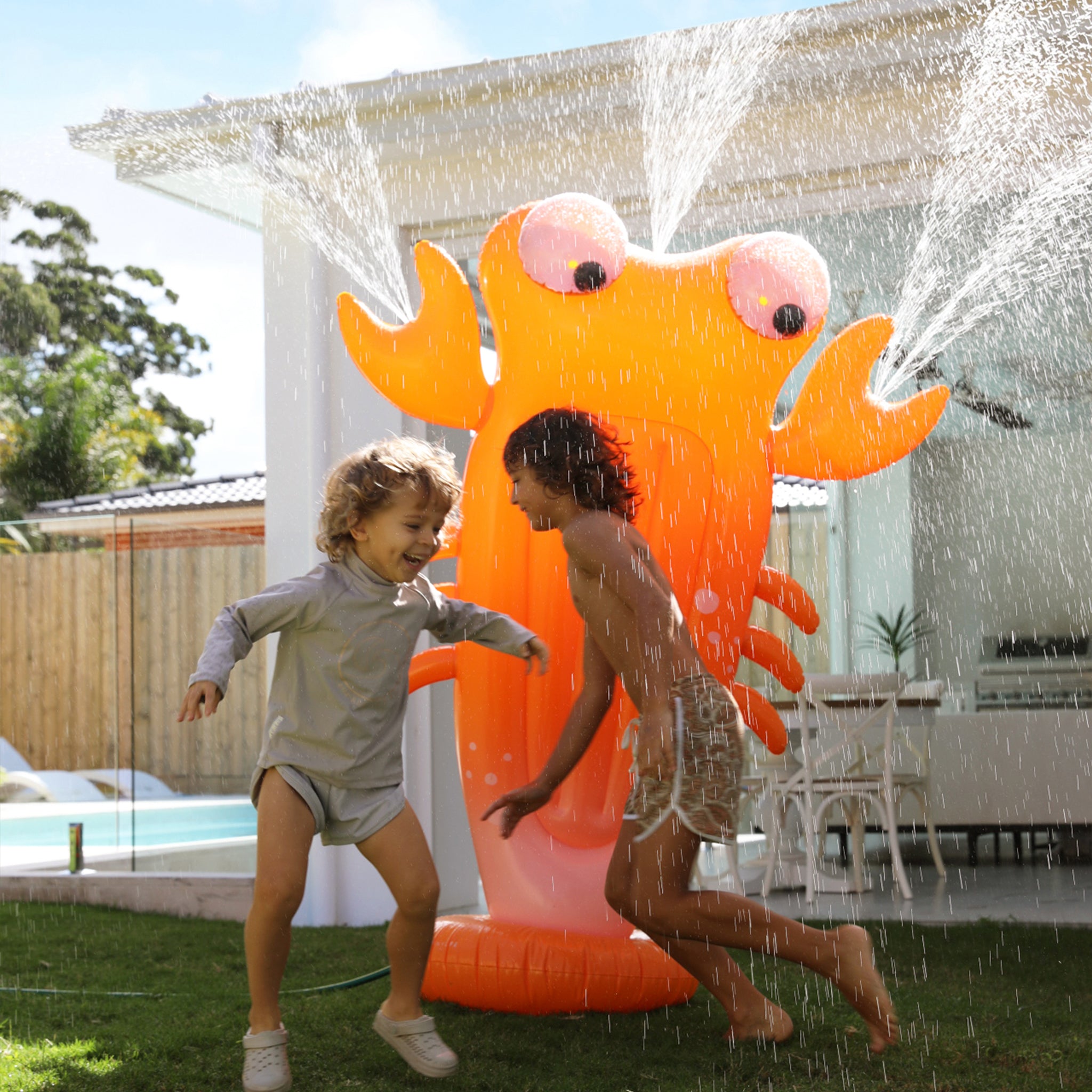 Inflatable Giant Sprinkler | Sonny the Sea Creature Neon Orange